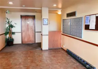 Secure building entrance with call box intercom. Heated lobby with tile floor, mail box location, quick elevator access. Fire sprinkler system throughout.
