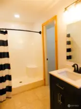 Shop shower and into large storage closet