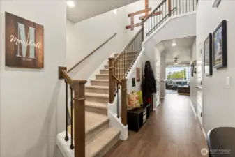 Classic Lennar builds have much more custom finishes, including the wrought iron/wood stairwell railing.