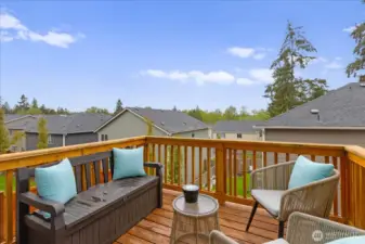 Lovely deck is located just off the dining space.  On a clear day there are forever views of the Cascade mountains.