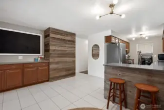 The wood plank details give this kitchen a cozy vibe, but the real star is the buffet counter—extra-long, extra-functional, and packed with storage to keep your space looking effortlessly organized.