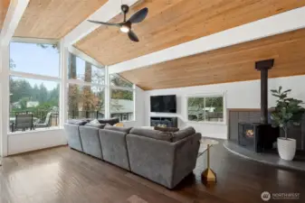 Wood stove corner? Check. Textured wood floors? Absolutely. And the best part: a view that opens up to your deck and Long Lake beyond. This family room is as functional as it is pretty. Also, all of the furniture in this house is negotiable!