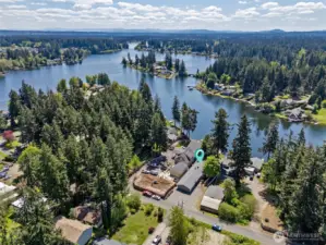 With towering pines in the distance and vibrant fall colors nearby, this back view offers the ultimate in tranquility. It’s the perfect spot to unwind and take in the ever-changing landscape of the seasons.
