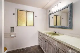 3/4 guest bath on the main level. Check out the iconic 70's flair!