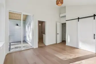 Primary Suite with view to the covered deck