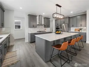 Bartop seating at large center island.