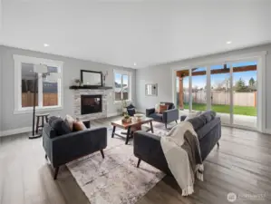 Sliding glass doors lead to large covered patio.