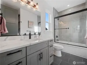 Downstairs bedroom full bath.