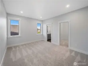 Guest bedroom #2 with full bath & walk-in closet.