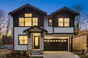 Photos of completed model on homesite #11 with identical floorplan.