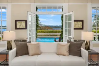 Captivating lake and mountain views from the formal living room.