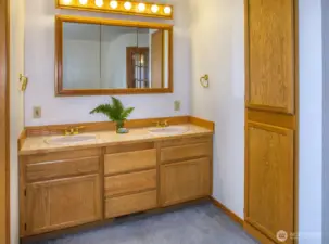 Main floor primary bedroom has en suite bathrom.
