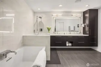 Gorgeous custom cabinetry and glimmering counters