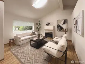 The living room offers a warm and comfortable retreat, anchored by a gas fireplace—perfect for relaxing evenings or hosting guests in style.