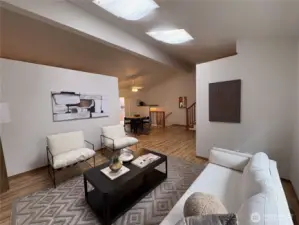 From the living room, enjoy a view back into the dining area and the unique split staircase—leading up to the private bedrooms and down to the attached double garage for everyday convenience.