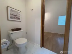 The private toilet room offers unexpected space and comfort—wide and thoughtfully designed for ease of use and added privacy.