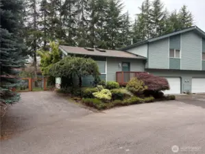 An additional parking space sits just outside the fully fenced backyard—perfect for guests or extra vehicles, with easy access to the private outdoor area.
