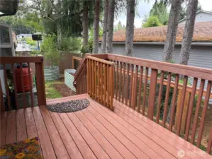 The upper deck is fully fenced—ideal for small pets or a secure outdoor spot to relax, play, or enjoy your morning coffee with peace of mind.
