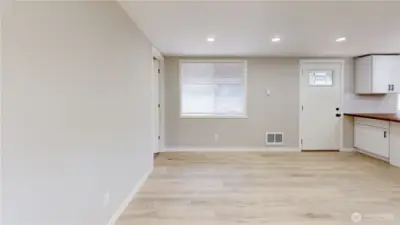 Additional view of the great room.  White trim and doors throughout the home.