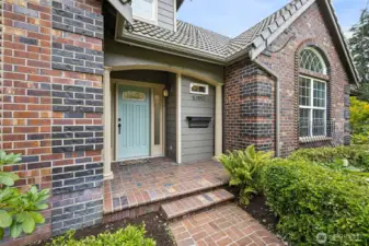 Tile roof and Professionally landscaped yard
