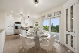 Beautiful stain glass in the Dining area with access to deck. Virtually staged