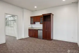 The Wet Bar has room for a FULL Kitchen for ADU or MIL Suite