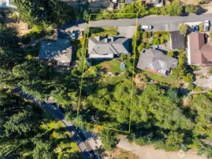 The lot extends pass the private road and down to Chrisella Road