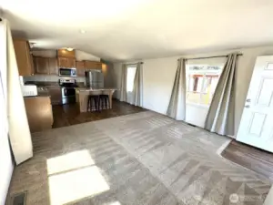 Spacious Living Room and Kitchen Areas.