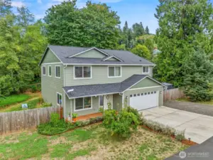 Newer 2373 sq foot home on 2 levels - partially fenced, RV/boat parking plus attached 2 car garage...