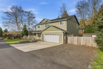 Newer 2373 sq foot home on 2 levels - partially fenced, RV/boat parking plus attached 2 car garage...