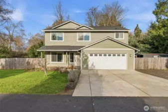 Corner lot, storage shed, fenced back yard, concrete parking apron...