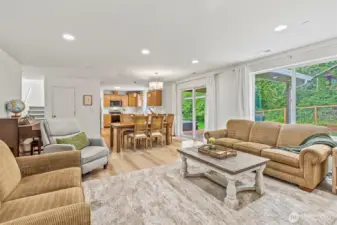 Fabulous open concept with viewing area straight through to kitchen. Solid surfaces and life-proof flooring, slider to covered back deck, large pantry and spacious dining...