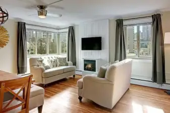 Hard surface flooring and ceiling fan. Great views and natural light!