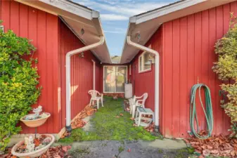 From backyard looking towards the slider in the dining room