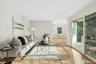 Large sliding glass doors to the covered balcony.