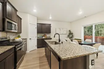 Granite counters and lots of storage in the kitchen