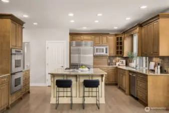 This home is move-in ready has a generous central island, double wall oven and cooktop, making mealtime carefree and wonderful for entertaining