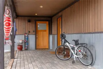 The large covered entry offers great weather protection and easy garage access.