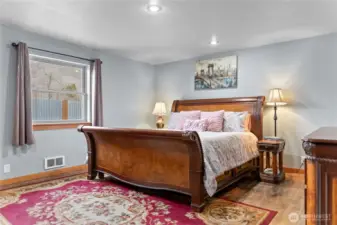 The primary bedroom is large enough for dressing, a seating area and connects to an en suite bathroom.