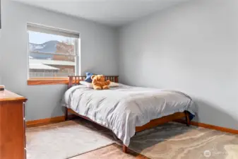 The home features two additional bedrooms with large closets.