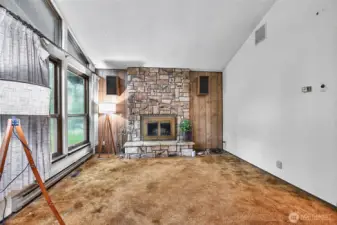 Cozy wood-burning fireplace in living room