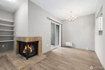 The dining space is tucked nicely in between the kitchen and the expansive private balcony.