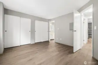 The bedroom is spacious and features double closets, bathroom access ,  updated floors, fresh paint and lots of room!