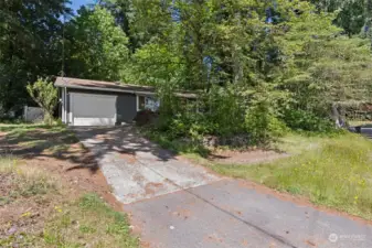 At the end of the long driveway you’ll find a Japanese Maple, and elsewhere on this big .205 acre property, you’ll find trees where you’ll be able to harvest Asian pears and cherries from! Boat or RV parking can easily be accommodates alongside the home too.