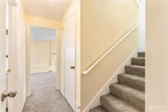 Bonus storage under staircase.