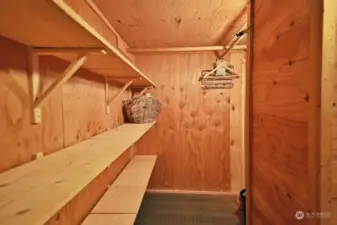 Walk in closet off of your full bathroom.  Space to hang clothes and plenty of shelf space to organize your simplified life.