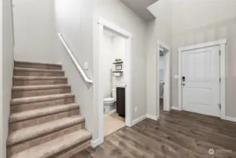 Wide hallways extra tall ceilings make this entry way feel grand.