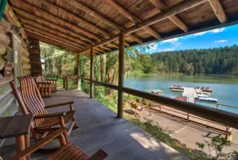 FRONT PORCH OF OUR HISTORIC CABIN AT THE LAKE