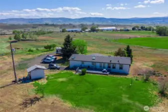 Backyard and wellhouse