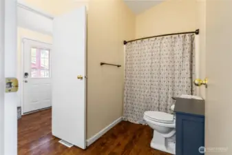 Full bath off living and utility room